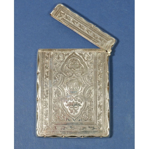 384 - A Victorian silver card case with engraved decoration, Birmingham 1876 by Stokes & Ireland