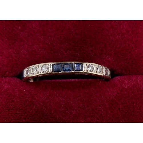 440 - A platinum eternity ring set sapphires & diamonds, size P-Q 2.6g