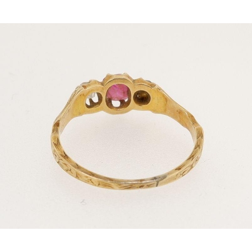 452 - A Victorian gold ring set ruby flanked by two old cut diamonds, size N, 2.3g