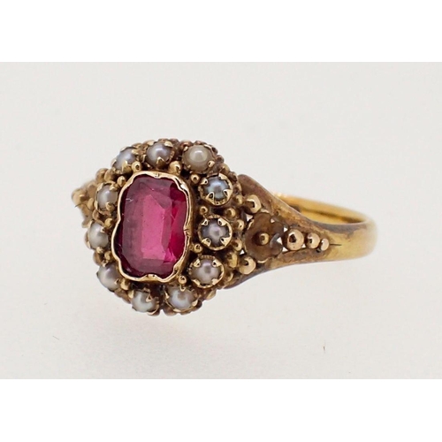 455 - A Victorian 15 carat gold ruby and pearl cluster ring, size M/N, cluster 1cm diameter, 2.5g