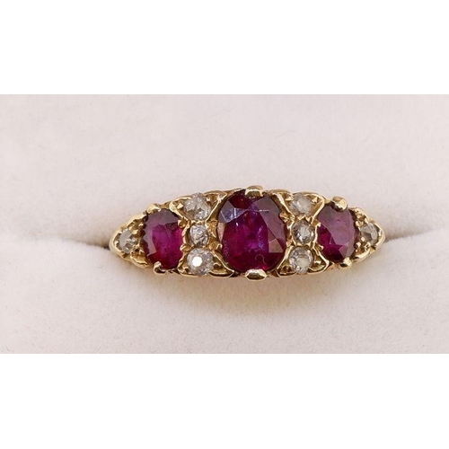 461 - A Victorian 18 carat gold ruby and diamond ring the three rubies interspersed with eight old cut dia... 