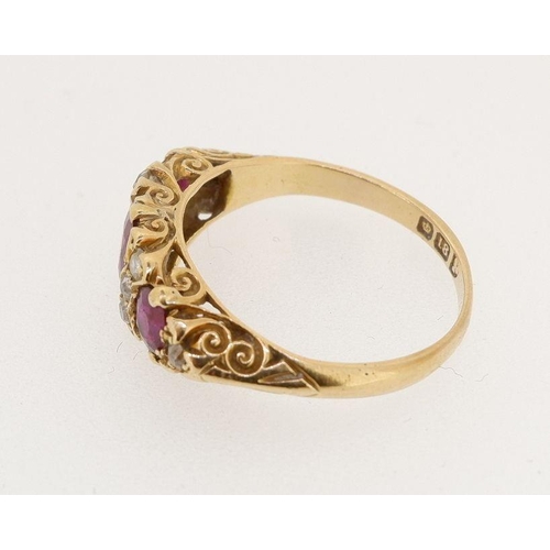 461 - A Victorian 18 carat gold ruby and diamond ring the three rubies interspersed with eight old cut dia... 