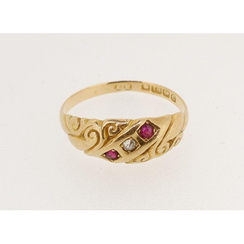 464 - A Victorian 18 carat gold ring set chip diamonds and two rubies, 2.8g, size P