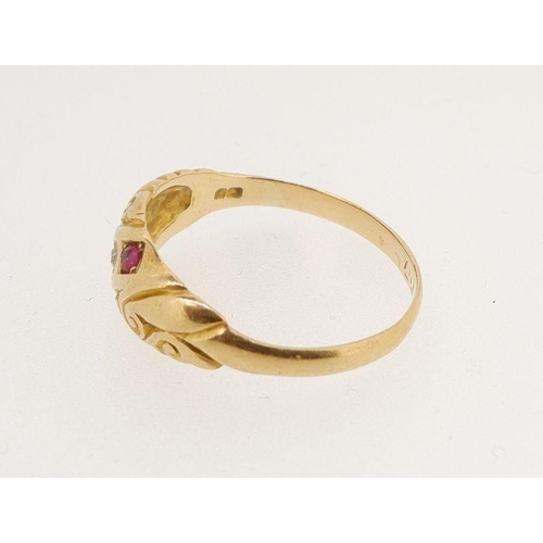 464 - A Victorian 18 carat gold ring set chip diamonds and two rubies, 2.8g, size P