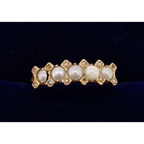 465 - A Victorian 18 carat gold ring set five pearls - one replaced, size M to N 1.7g