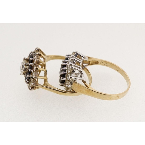 466 - Two 9 carat gold rings set blue stones and cubic zirconium, size N