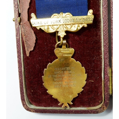 470 - A 9 carat gold and enamel masonic medal on gilt metal mounted ribbon for the Duke of York Lodge pres... 