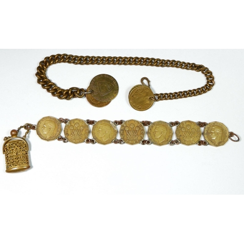 540 - A bracelet of sixpences with miniature antique gilt brass coin or chatelaine purse and a brass fob c... 