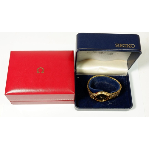 672 - A vintage red Omega watch box with original outer card box together with a Seiko Quartz wristwatch, ... 