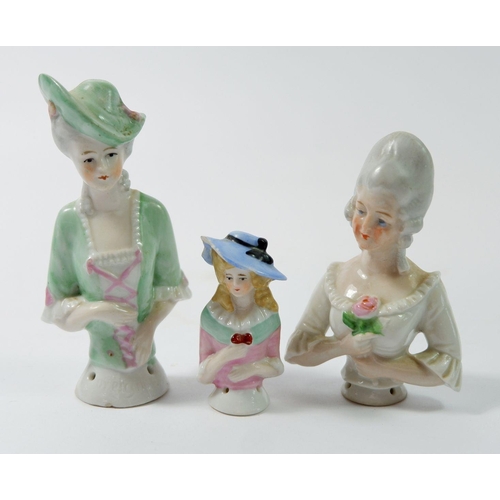 69 - Three porcelain pin dollies, tallest 10cm