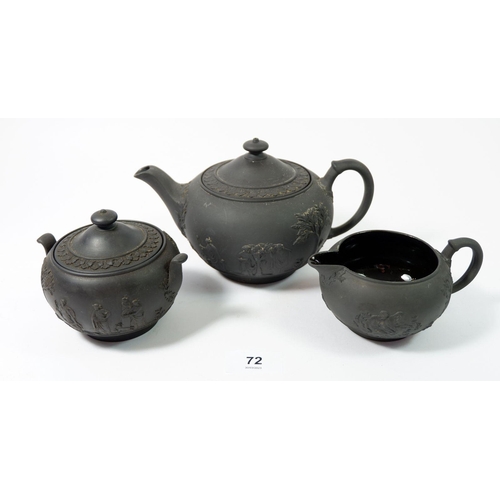 72 - A Wedgwood black basalt three piece teaset comprising: teapot, jug and sugar