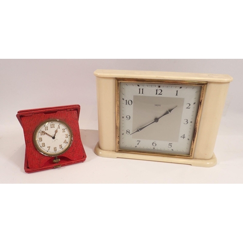 770 - A Smiths clock with an early plastic surround, 22cm wide and an eight day Doxa Swiss travel clock in... 