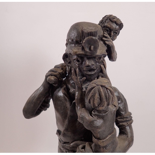 775 - Phylis Lewis (1934-2010) ceramic figure of a miner, black clay, signed, 34cm (Phyllis Lewis was an A... 