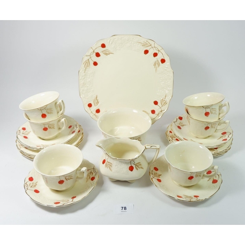 78 - A vintage tea service comprising: six cups and saucers, six tea plates, jug and sugar 'Cherry Ripe'