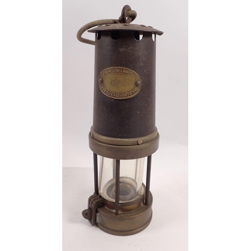 780 - A Patterson Lamps Ltd miners lamp, stamped GPO 555 Type A3, Gateshead on Tyne, 26cm