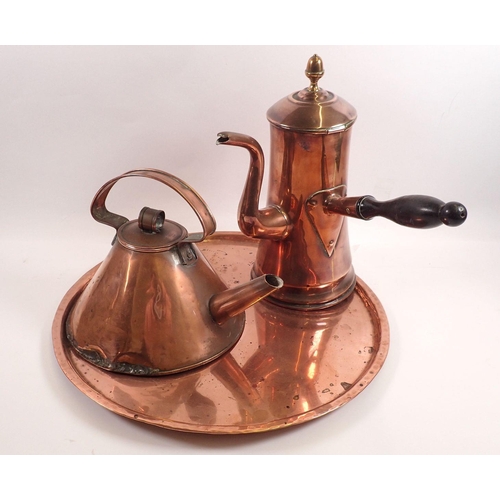 784 - A 19th century large copper chocolate pot, 27cm with turned wood handle, a copper kettle and a circu... 