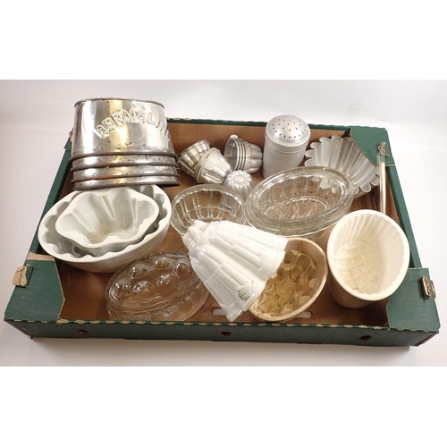 785 - A box of kitchenalia including jelly moulds and Bermaline loaf tins, therometer etc