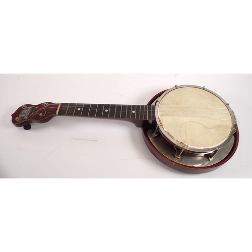 793 - A George Formby banjolele, cased