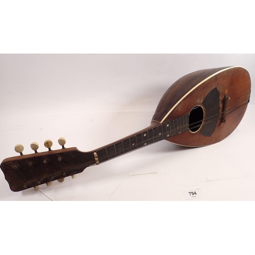 794 - A 19th century American eight string mandolin, bone pegs and inlay, labelled inside Regal MFG Co Wol... 