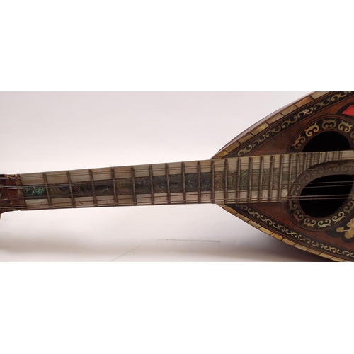 795 - A 19th century twelve string mandolin with a mother of pearl and abalone fingerboard, fluted rosewoo... 