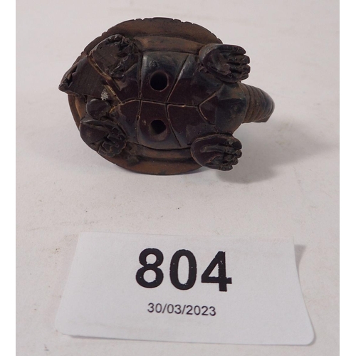 804 - A Japanese carved hardwood netsuke with hare riding a tortoise