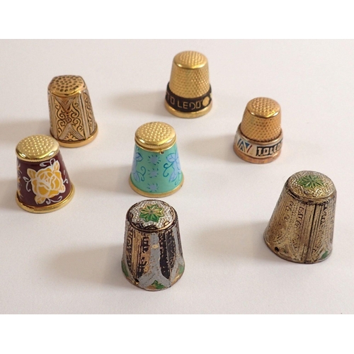 810 - Seven decorative enamelled thimbles