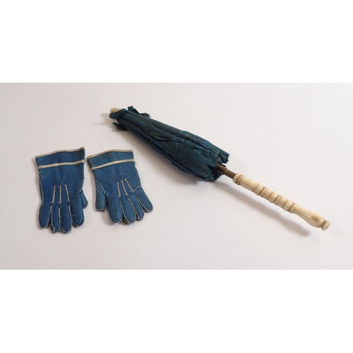 811 - A Victorian bone handled doll's parasol, 17cm and pair of blue leather dolls gloves, 7cm long