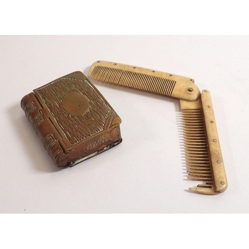 818 - A Victorian brass book form vesta and stamp holder and a folding bone comb