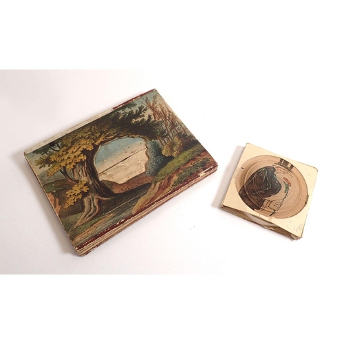 823 - A Victorian Telescopic Peepshow concertina landscape card and a coiled paper novelty push out pictur... 