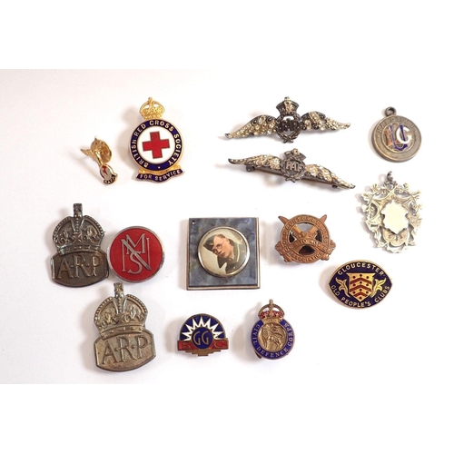 828 - A Red Cross service badge, two silver RAF brooches, two silver sports medals, two ARP badges, Civil ... 