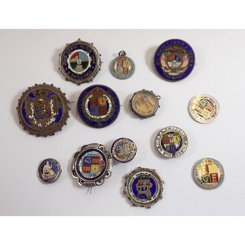 829 - A collection of thirteen antique enamelled silver coin brooches and pendants etc.