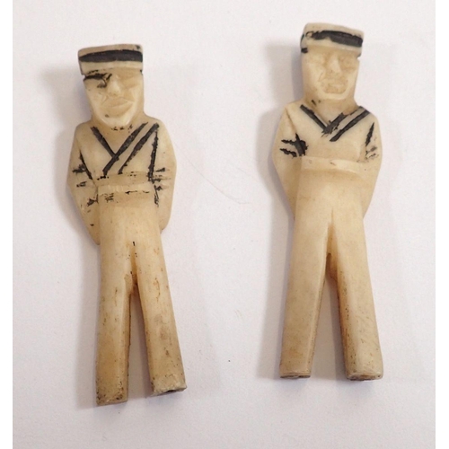 833 - Two 19th century carved bone scrimshaw figures of sailors, 7cm