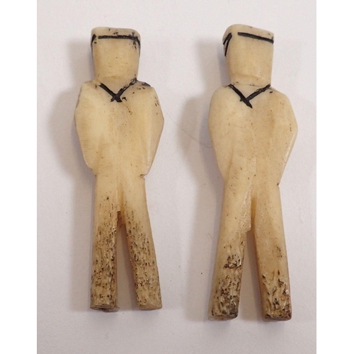 833 - Two 19th century carved bone scrimshaw figures of sailors, 7cm