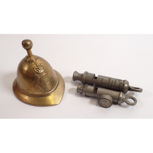 835 - An EMCA Boy Scout whistle, a Metropolitan Hudson Police whistle and a fireman's helmet for novelty b... 