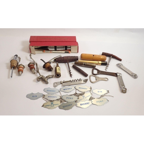 844 - A collection of Breweriana items including decanter labels, Guinness bottle openers, miniature Haig'... 