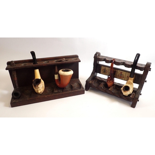 849 - Two vintage pipe racks and a selection of pipes