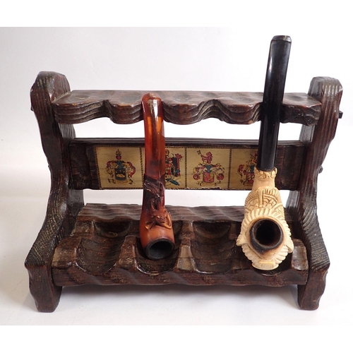 849 - Two vintage pipe racks and a selection of pipes