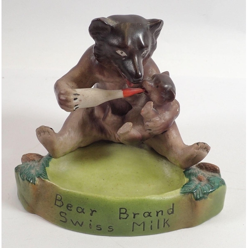 856 - A Bear Brand Swiss Milk advertising pin dish with mother bear feeding her baby - a/f