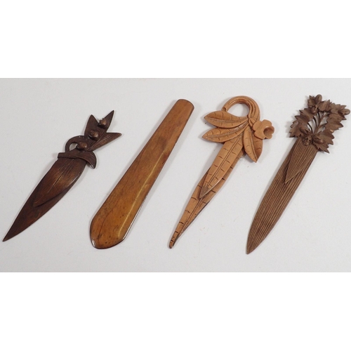 861 - Four carved wooden bookmarks