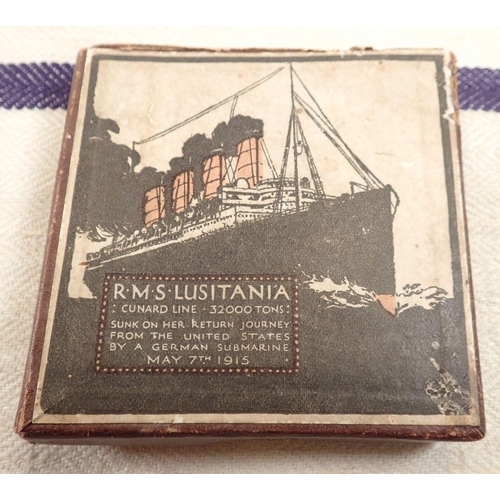 882 - A Lusitania medal and a Kriegsmarine linen flag, 48 x 92cm