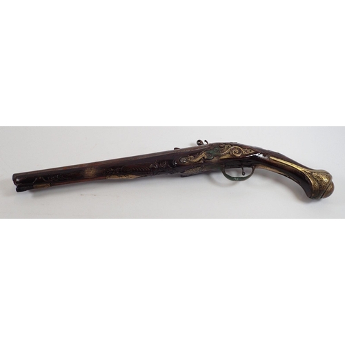 883 - A 19th century continental flintlock pistol, 50cm long