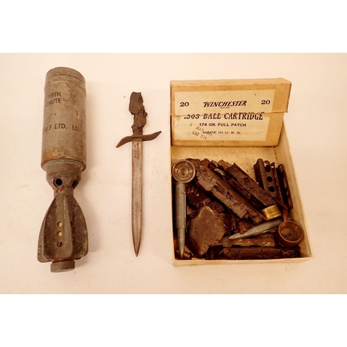 890 - A WWII parachute flare case, a Battle of Britain shrapnel paperknife, a box of cartridge cases and s... 