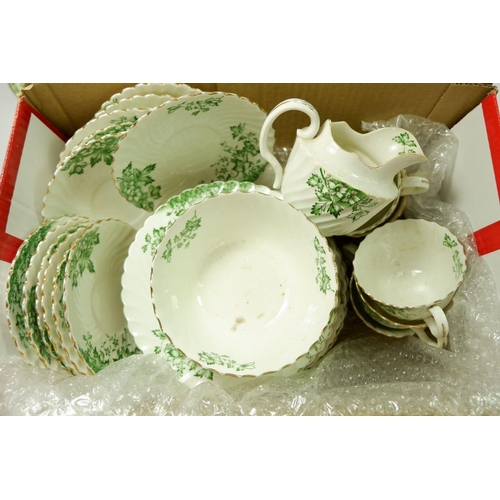 90 - An Edwardian tea service printed leaves comprising: six cups and saucers, ten tea plates, cake plate... 