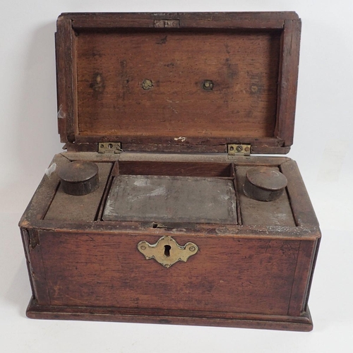 906 - A Georgian mahogany rectangular tea caddy with brass handle and escutchecon fitted metal caddies and... 