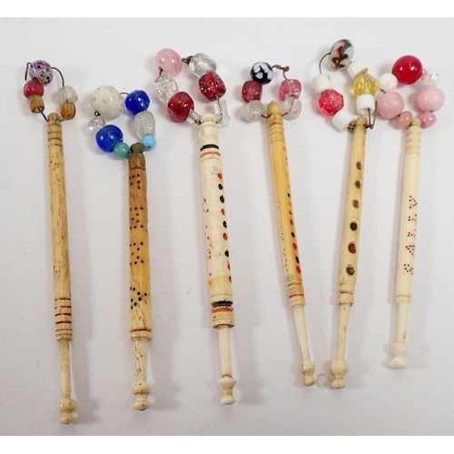 927 - A collection of eleven 'named' bone lace making bobbins