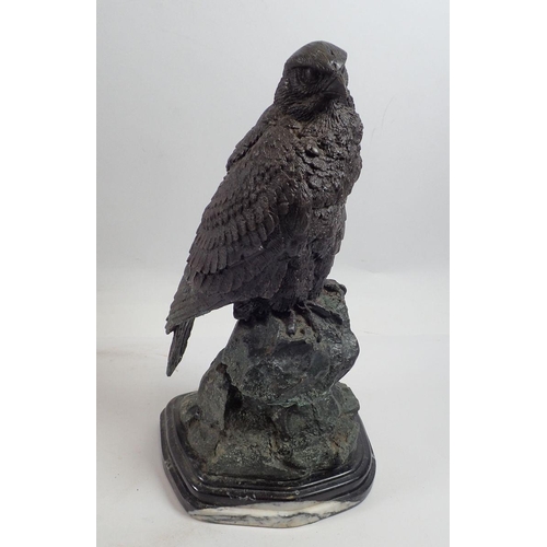 954 - A cast bronze of a bird of prey signed Barrie, 27cm