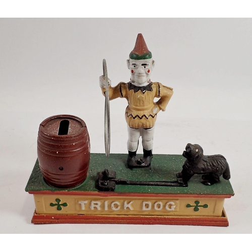 977 - A reproduction cast iron 'Trick Dog' money box, 21 x 18cm