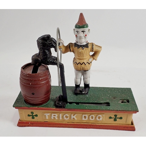 977 - A reproduction cast iron 'Trick Dog' money box, 21 x 18cm