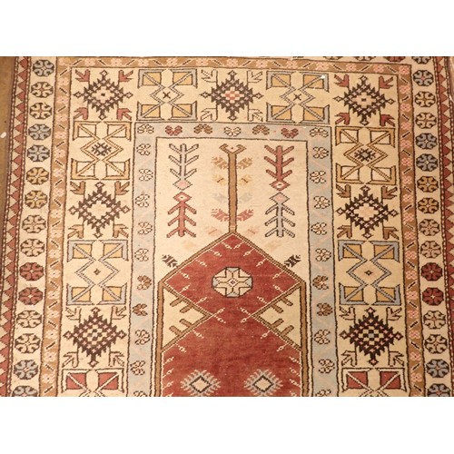 1247 - A Turkish geometrical rug with cream ground, 200 x 112cm, with original certificate