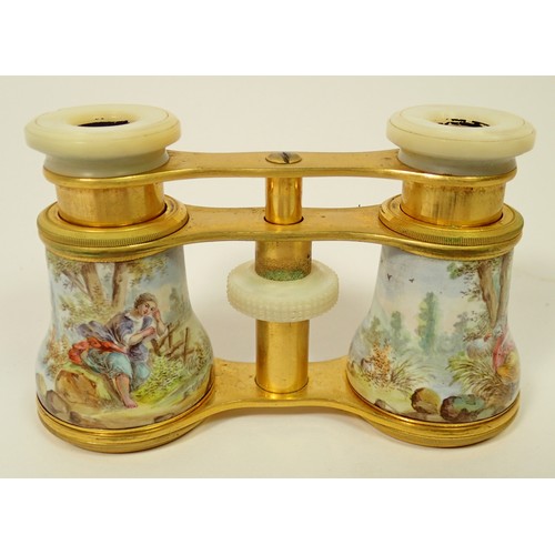 816 - A pair of late 19th century enamelled opera glasses decorated rococo landscape scenes with mother of... 